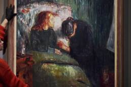 Edvard Munch: love and angst exhibition. A staff member adjusts The Sick Child (1907) during a preview for the Edvard Munch: love and angst exhibition at the British Museum, central London. Picture date: Monday April 8, 2019. Photo credit should read: Nick Ansell/PA Wire URN:42220258 (Press Association via AP Images)